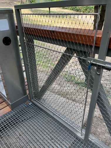 Wire mesh railings on a treetop walkway in Balatónboglar