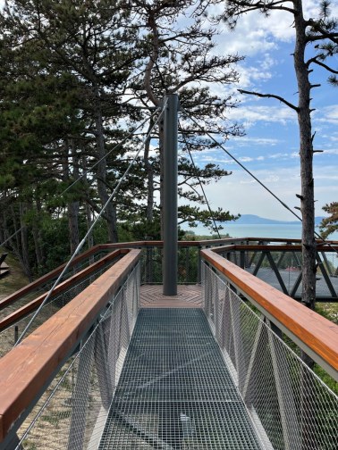 Wire mesh railings on a treetop walkway in Balatónboglar