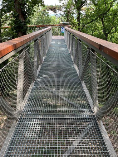 Wire mesh railings on a treetop walkway in Balatónboglar