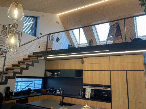 Wire mesh staircase railing in residential house