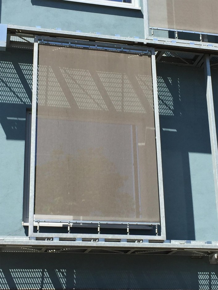Tensioned metal facade using wire fabrics.