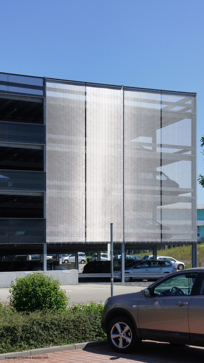 Metal facade of a parking garage, wire mesh used, side view