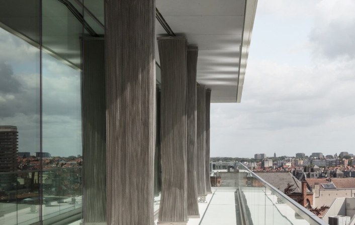 Shading in the form of a metal curtain, spiral nets used - view from the terrace